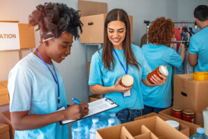 group of people working in charitable foundation. happy voluntee