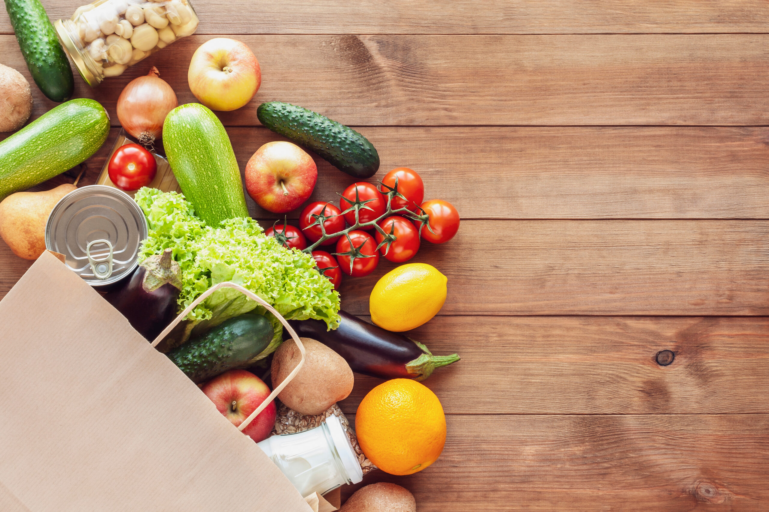 paper shopping food bag with grocery and vegetables